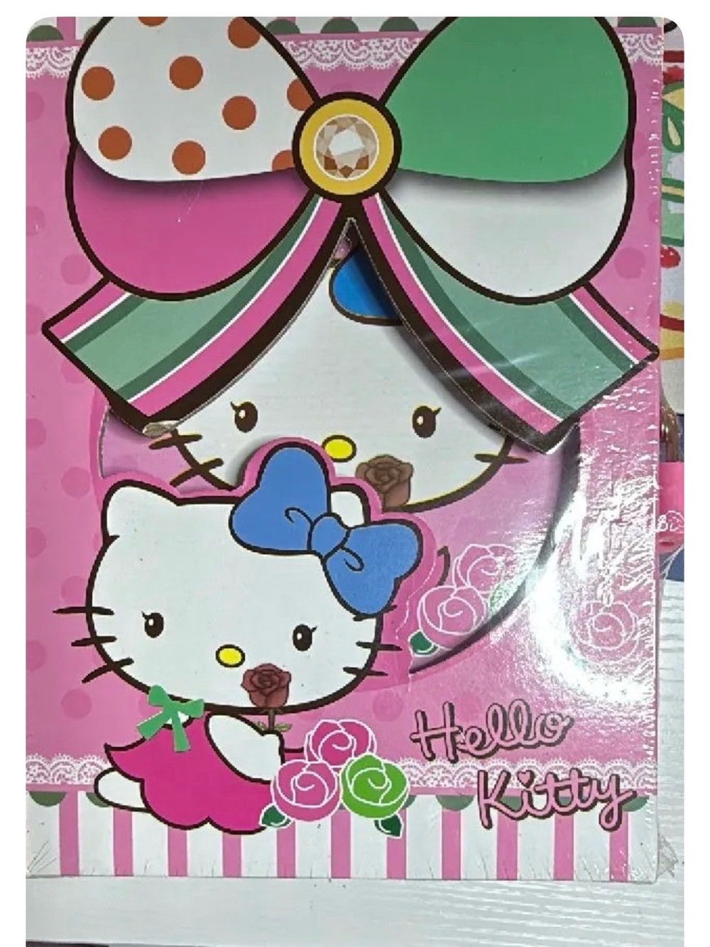 Hello Kitty diary book that has a bow adorned decorative locking box.